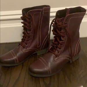 Maroon Steve Madden combat boots.